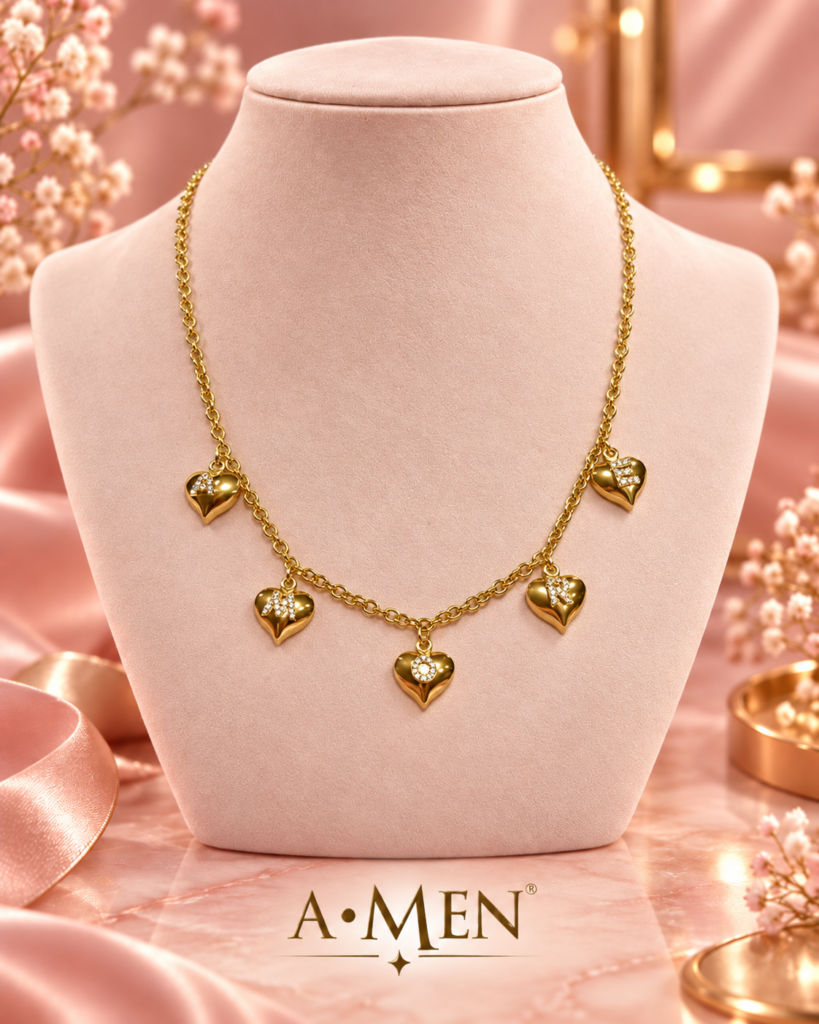 Collana A•MEN in acciaio dorato con cinque cuori pendenti