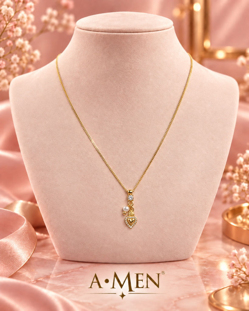 Collana A•MEN in argento dorato con cuore, perla e dettagli luminosi